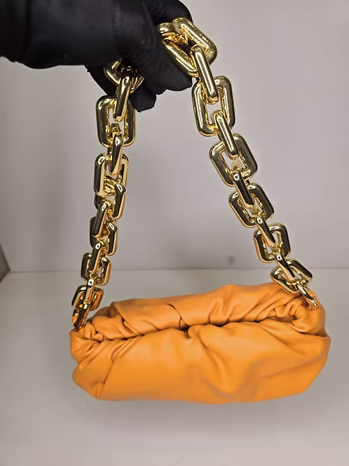 CHAIN-POUCH-ORANGE-LEATHER-1 BOTTEGA CHAIN POUCH ORANGE LEATHER BAG - Image 1